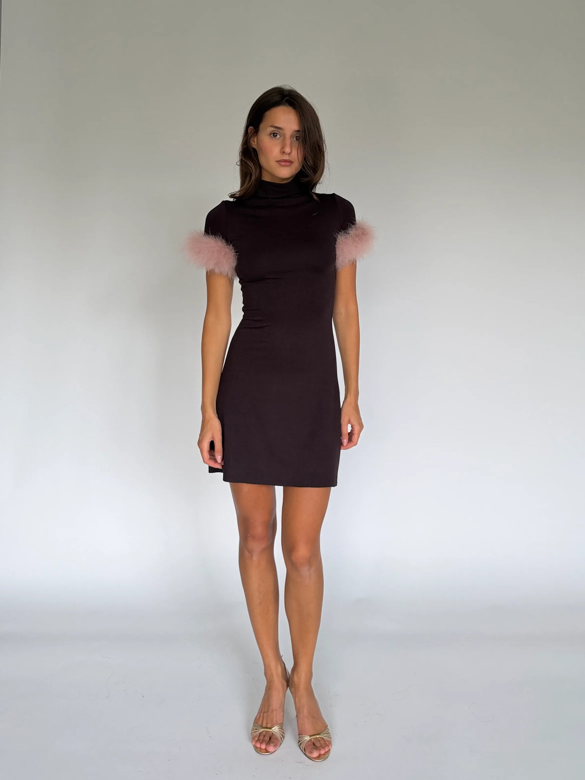 NOA chocolate mini dress on a model, full-length front view with pink marabou feather sleeves